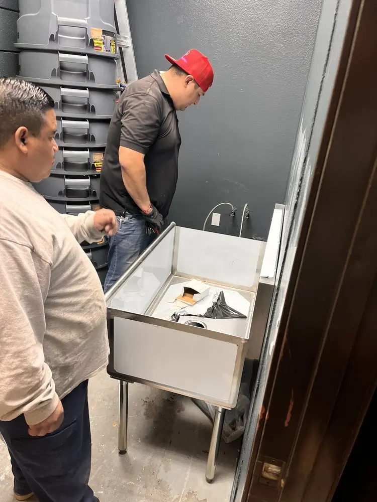 Commercial plumbing and sink installation in Leroy
